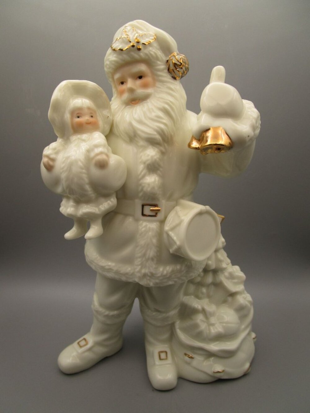 Santa Claus Ceramic Figurine With Child Cream Gold Accents Elegant Holiday Home